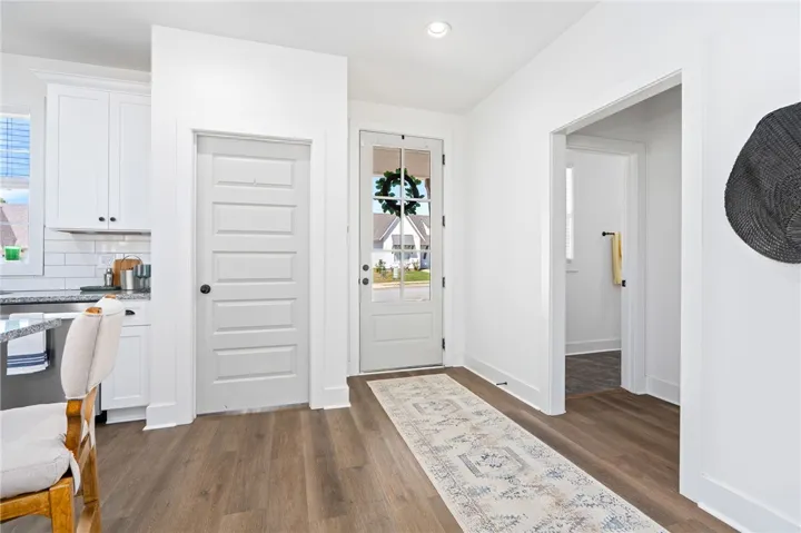 Entry way leading into the open concept floorplan.