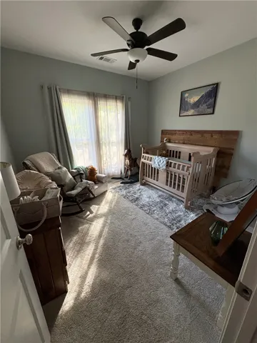 This cozy room offers a tranquil retreat for rest and relaxation.