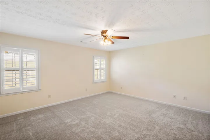 guest room with brand new carpet