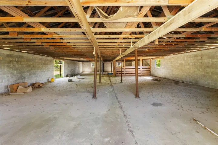 inside the barn- poured slab and concrete blocks