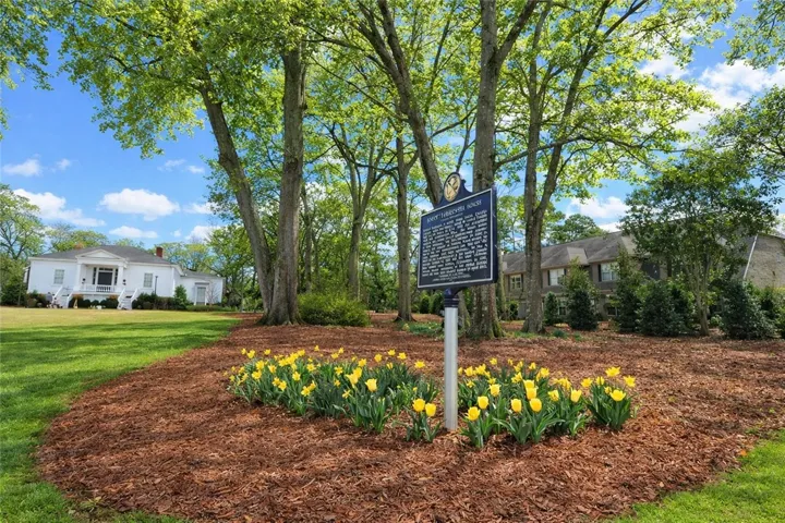 Your backyard overlooks Auburn University's historic Pebble Hill & mature Magnolia trees & lush landscaping.