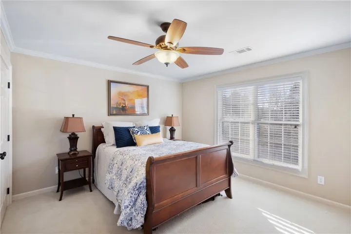 This inviting bedroom provides a comfortable and tranquil retreat.