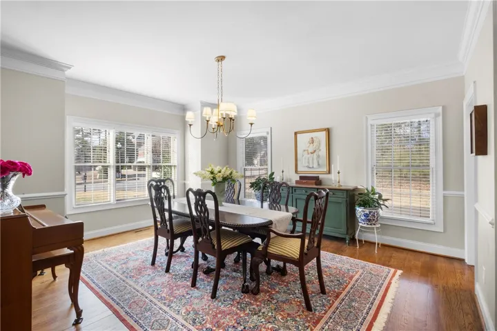 This elegant dining space offers a warm ambiance for memorable gatherings.