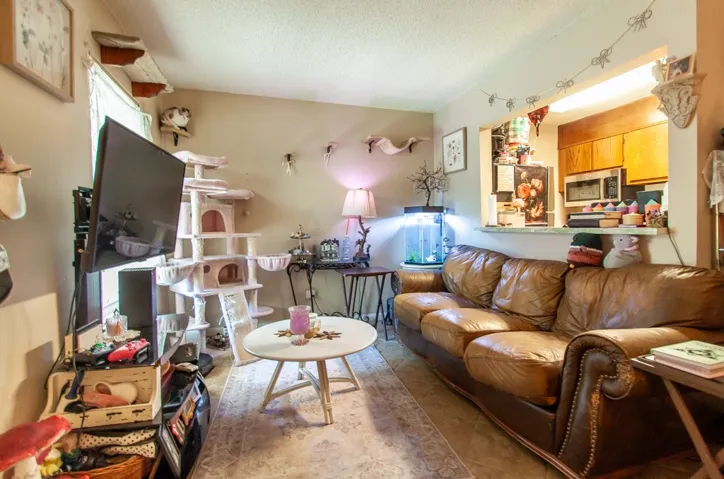 This living room provides a warm and inviting atmosphere, perfect for comfortable living.