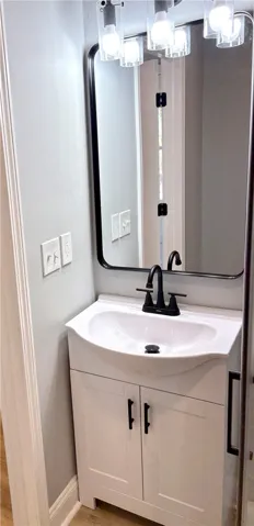 Full bathroom by garage entry