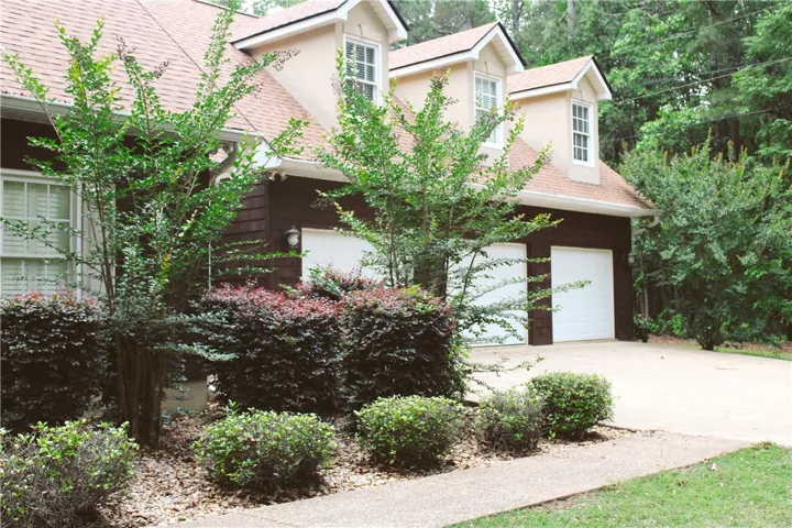 This charming home offers curb appeal and a convenient attached garage.