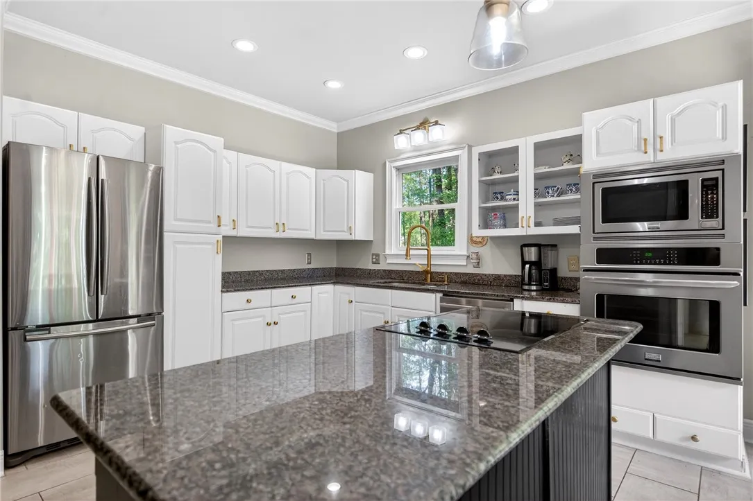 This bright kitchen features modern appliances and ample counter space.