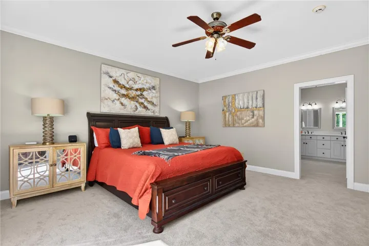 This inviting bedroom offers comfortable living with a convenient en-suite bathroom access.