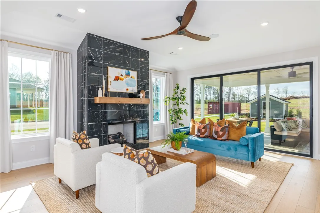 This image is of a previously built Azalea B model home, not the home for sale.