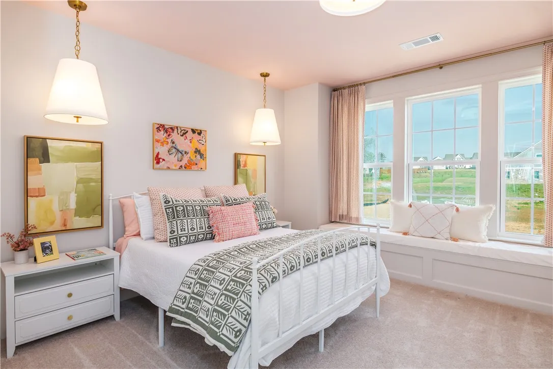 This image is of a previously built Azalea B model home, not the home for sale.