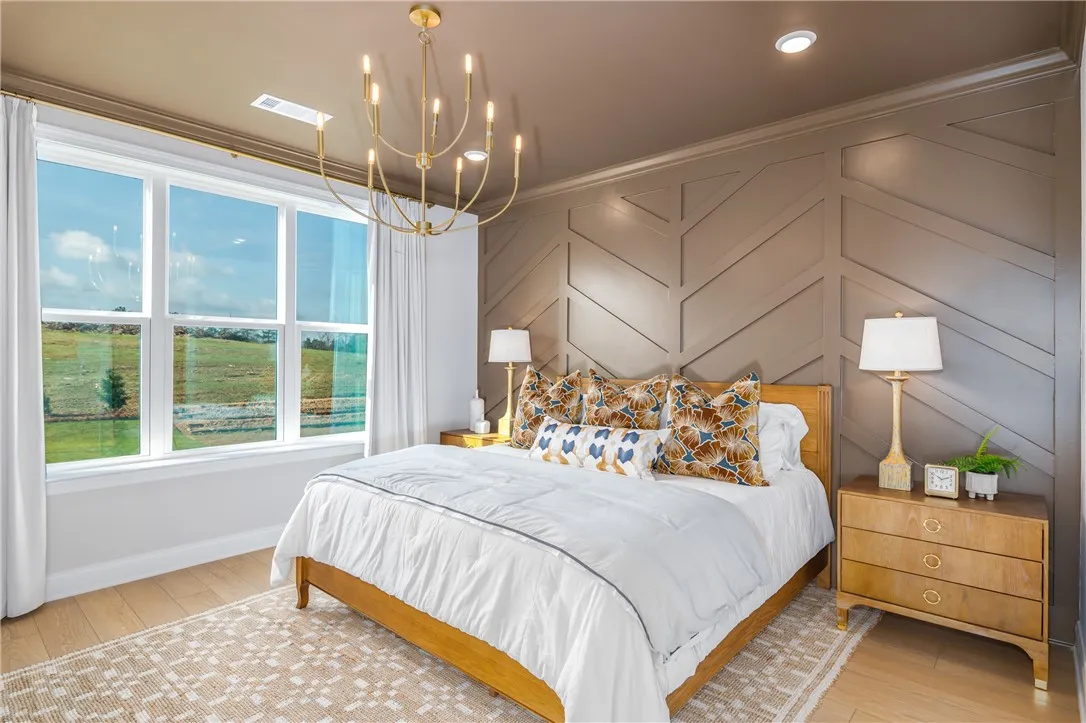 This image is of a previously built Azalea B model home, not the home for sale.