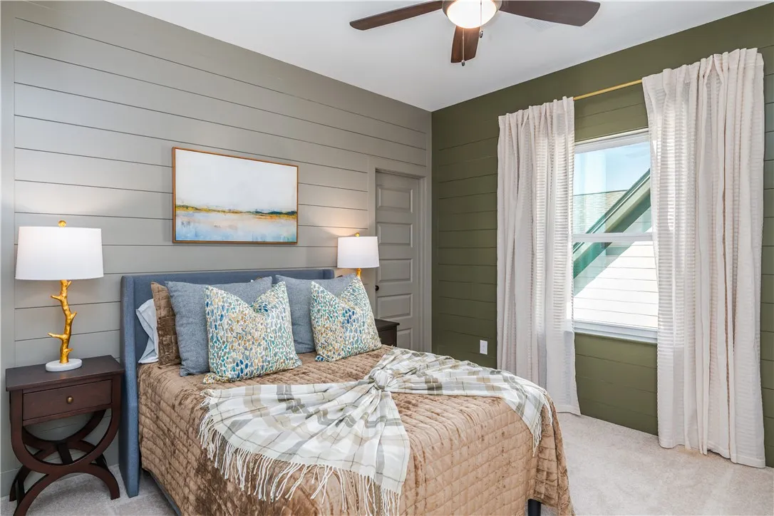 This image is of a previously built Azalea B model home, not the home for sale.