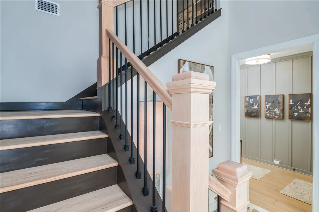 This image is of a previously built Azalea B model home, not the home for sale.