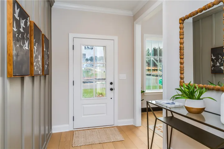 This image is of a previously built Azalea B model home, not the home for sale.