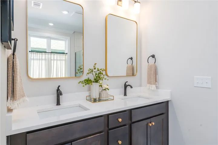 This image is of a previously built Azalea B model home, not the home for sale.