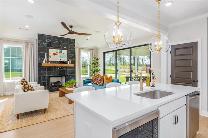 This image is of a previously built Azalea B model home, not the home for sale.
