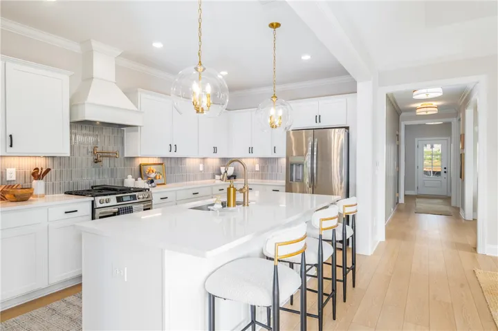 This image is of a previously built Azalea B model home, not the home for sale.