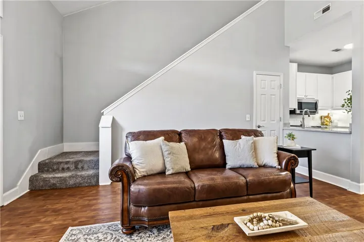 Excellent storage under stairs!  Stairs lead to owner's suite & bonus.