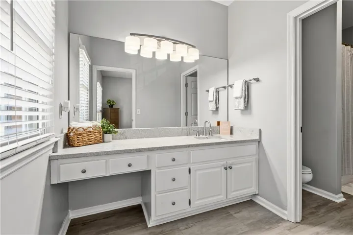 Ensuite bath with ample counter space, perfect for daily routines.