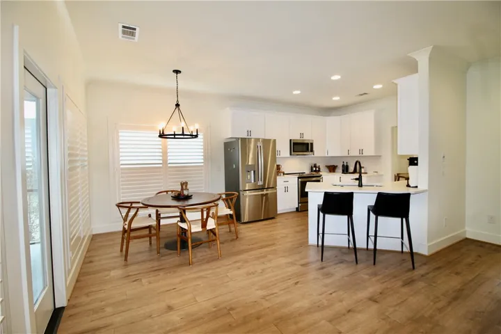 I love the clean lines and lighting.  The can lights are perfect.