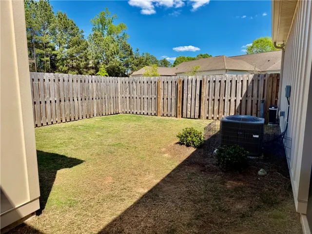 Another angle of the fenced outdoor area.