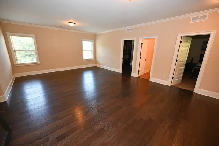 Open living room leads to bedrooms.