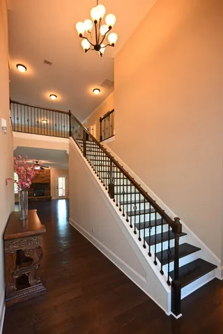 Stairs to the 2nd floor upon entry.