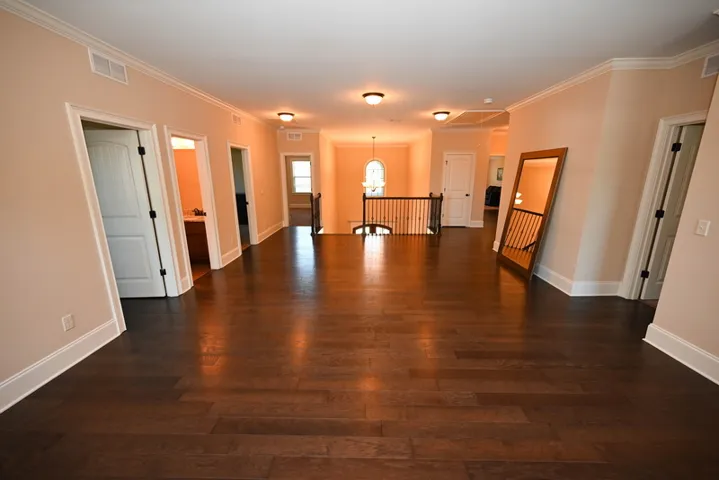 The second floor boasts a second living space, 4 bedrooms and a bonus room!
