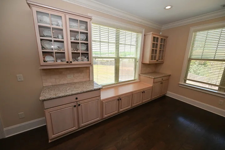 Breakfast nook with a built-in China cabinet and serving counter!