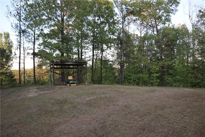 This expansive lot offers a tranquil, natural setting with ample space for diverse outdoor activities.