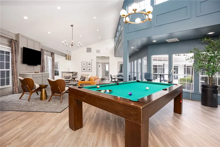 This versatile recreation room offers ample space for relaxation and entertaining guests.