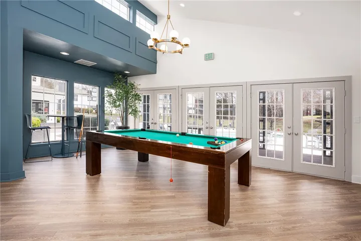 This recreational area features ample natural light and an open layout, perfect for entertaining.