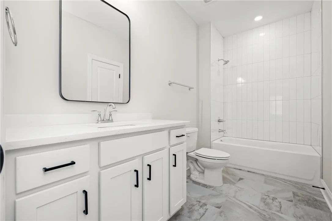 This image is of a previously built Foxglove A home, not the home for sale.