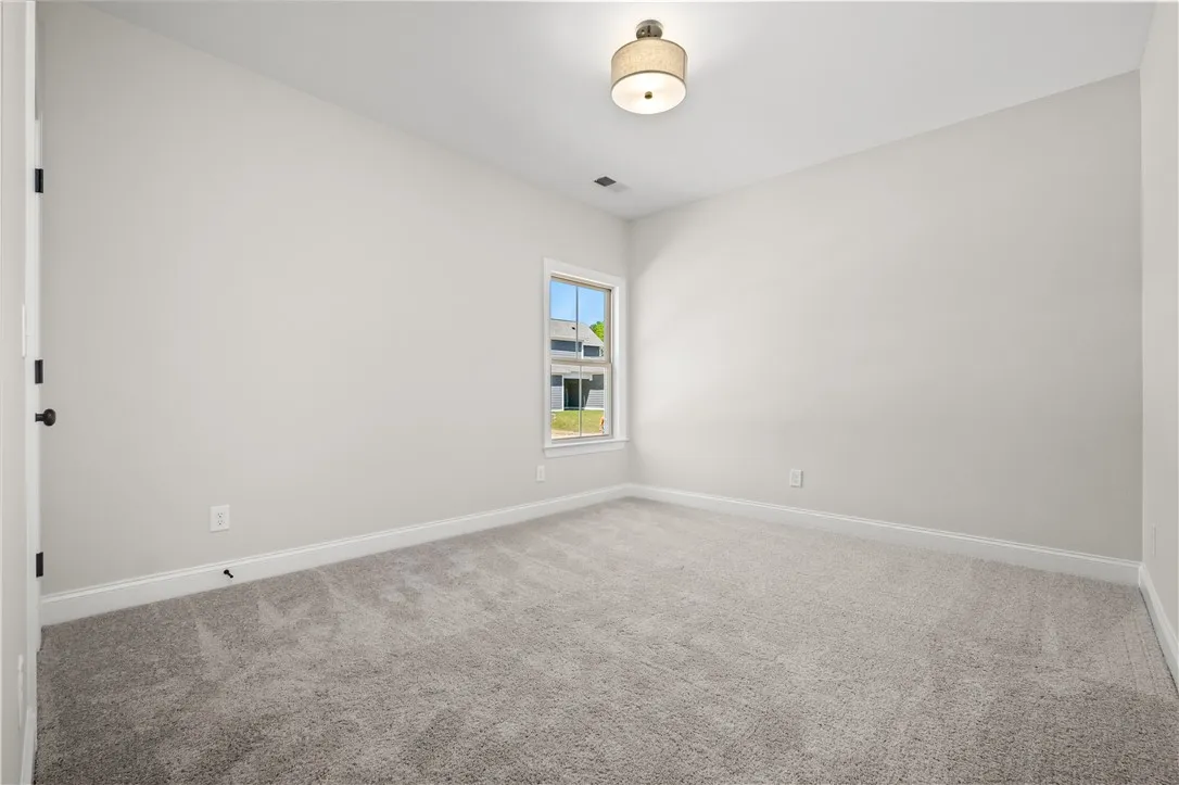 This image is of a previously built Foxglove A home, not the home for sale.