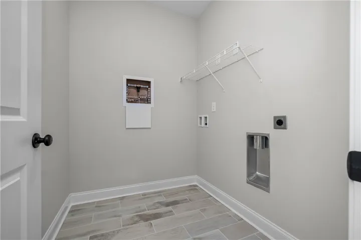 This image is of a previously built Foxglove A home, not the home for sale.