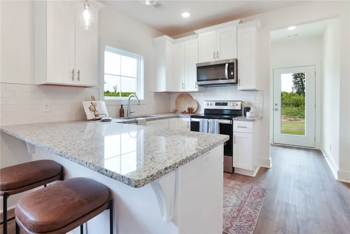 Photo is an example of a completed Camellia Duette. All plans, pricing and specifications are subject to change without notice.