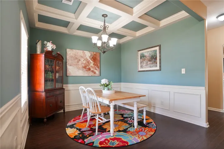 This dining room offers a warm and inviting atmosphere, perfect for memorable gatherings.