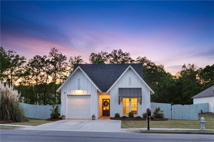 This charming home offers curb appeal with modern architecture and a welcoming ambiance.