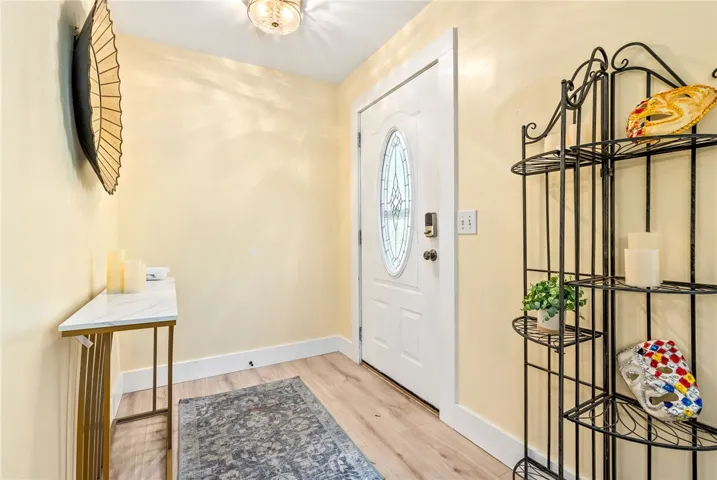 An inviting entryway with durable flooring and ample space welcomes all who enter.