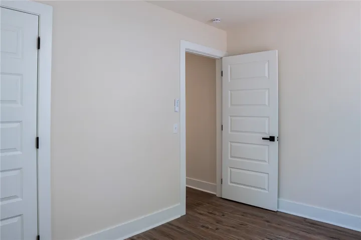 This welcoming room features durable flooring and clean, freshly painted walls.