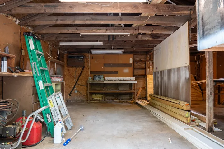 This versatile workshop area provides ample space for projects and storage.