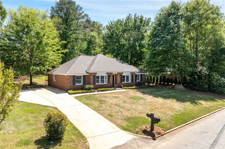 This charming brick home is nestled off N College just 2 miles from Toomer's Corner.