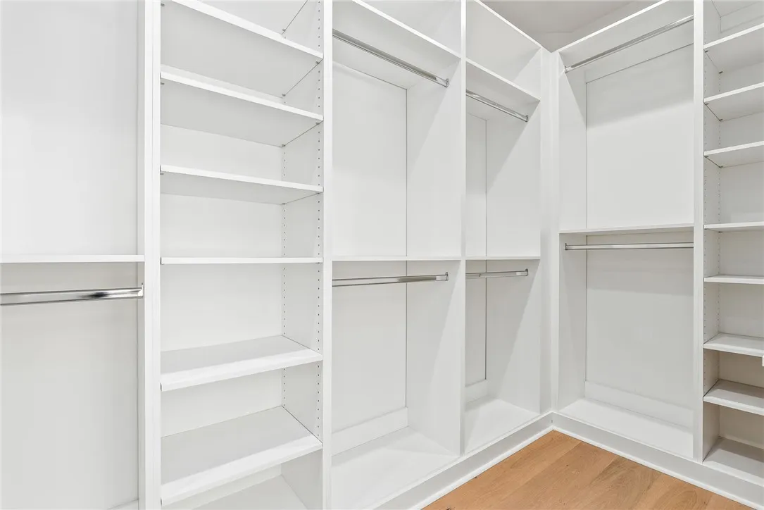 A custom closet provides a well-organized, functional space for storage.