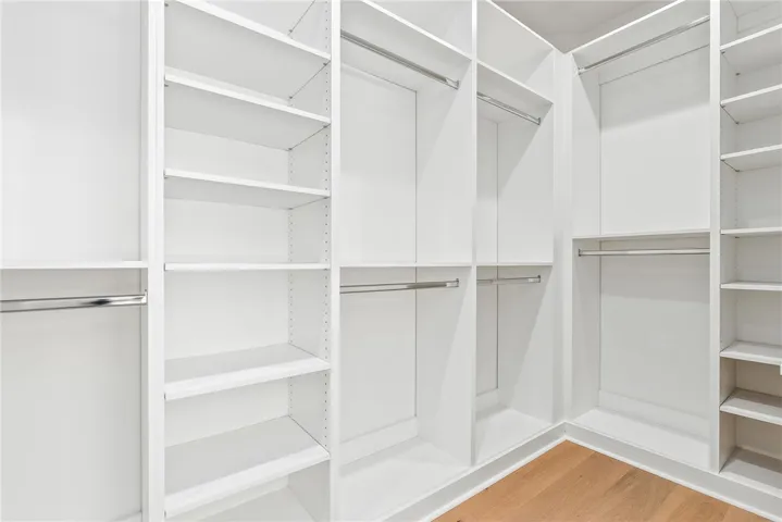 A custom closet provides a well-organized, functional space for storage.