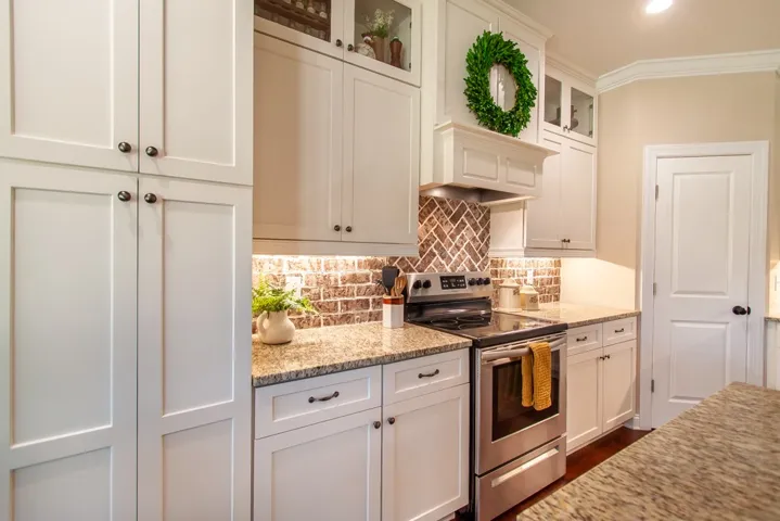 This thoughtfully designed kitchen offers both charm and practical elegance for daily living.