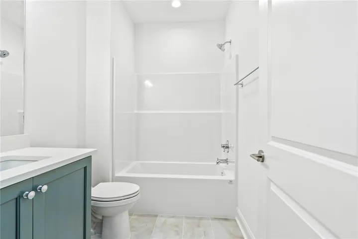 The second-floor bath services the bedroom and bonus room.