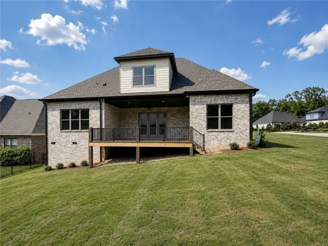 Positioned on a corner lot, the property offers generous rear and side yard space.