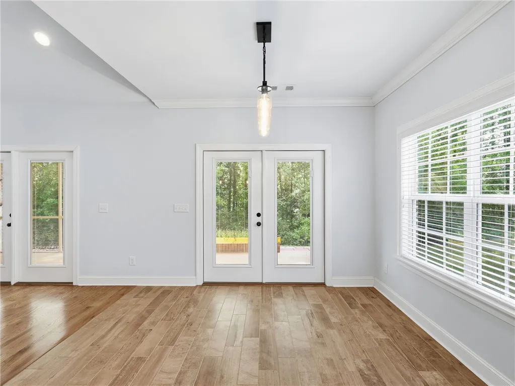 This bright space features natural light and a seamless transition to the outdoors.