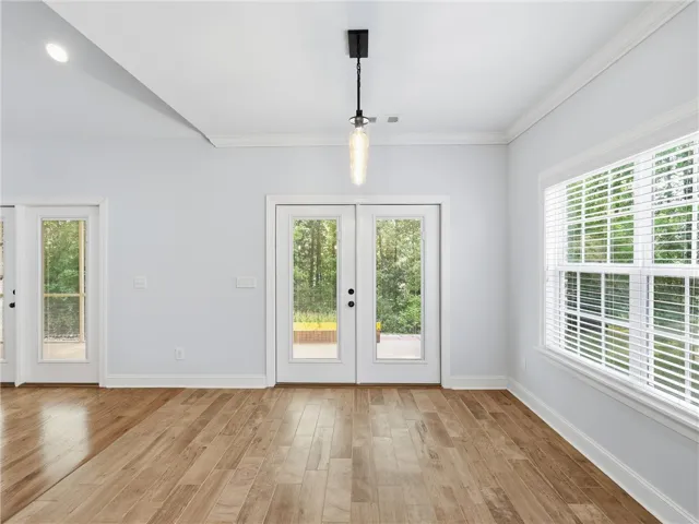 This bright space features natural light and a seamless transition to the outdoors.