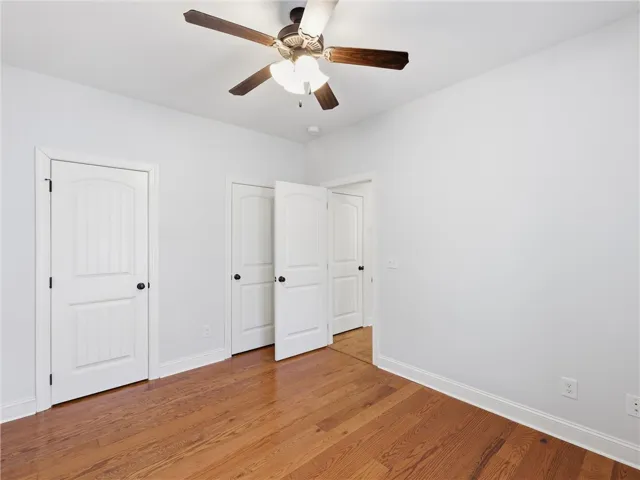 This bright room features beautiful hardwood floors and convenient access points.